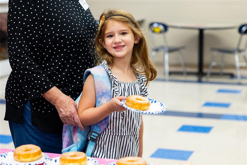 Sunset Elementary hosts Donuts with Grown-Ups